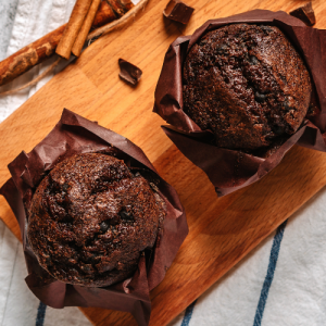 chocolate chip cupcakes, decadent chocolate treats, moist and fluffy cupcakes, rich melted chocolate chips, sweet cravings, beautiful dome-shaped appearance, homemade charm, easy-to-make cupcakes, pure chocolate bliss, irresistible dessert